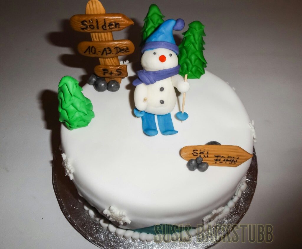Ski Fahrer Torte mit Schneemann
